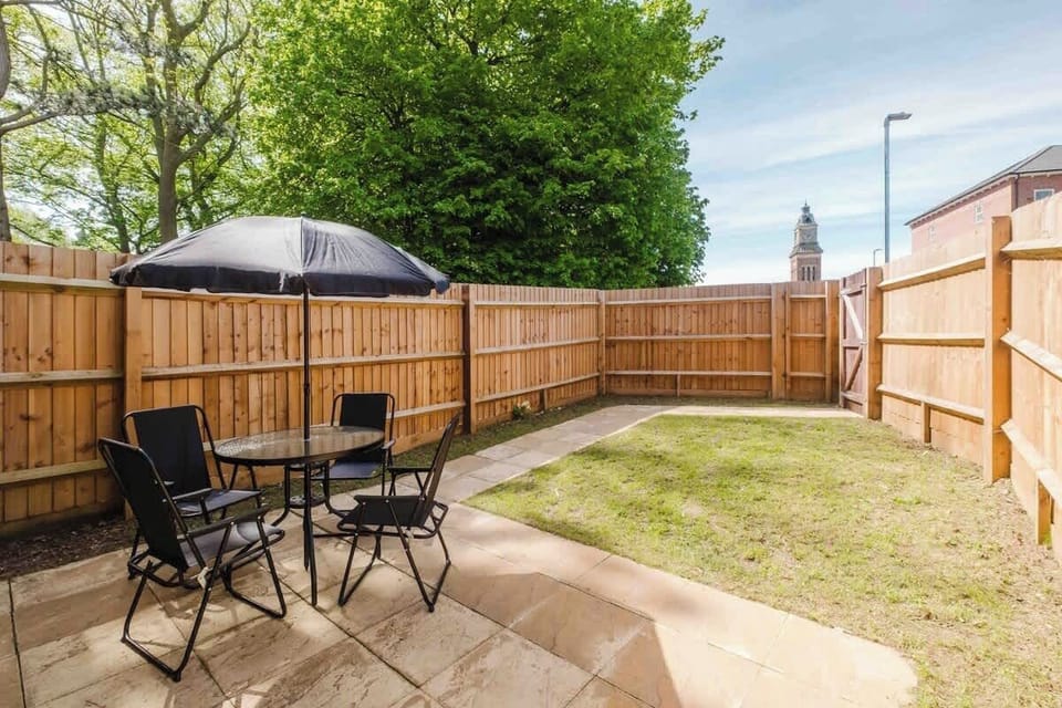 Embrace outdoor living in your private garden with a spacious patio area—ideal for morning coffee or evening drinks