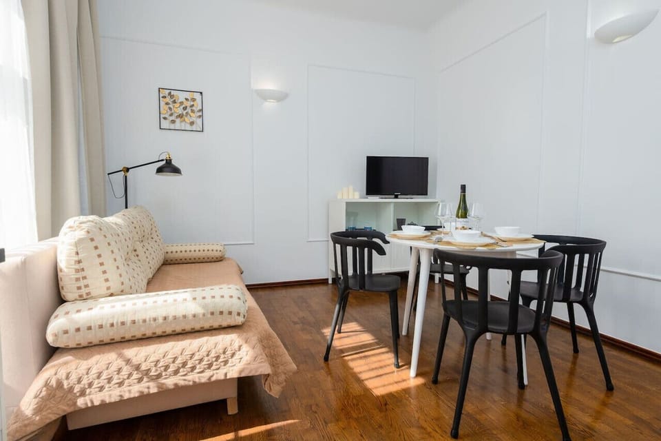 Living Room with Smart TV and Sofa Bed | Book Now with RENTUJEMY.COM