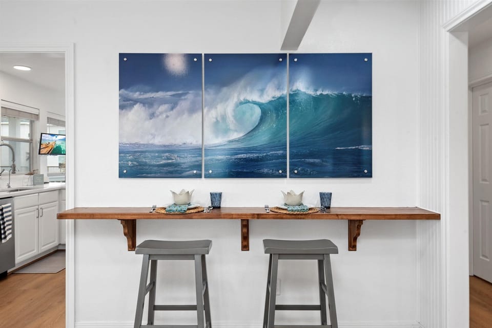 There is additional seating for 2 at a buffet bar and 2 in a corner living room table if you desire to spread out. 