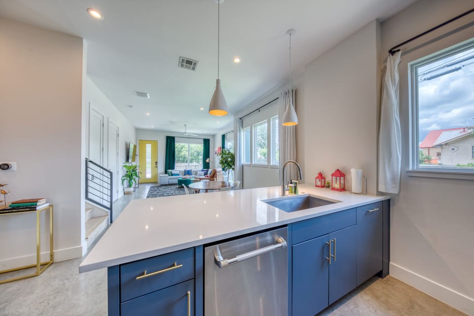 Kitchen with drip coffee maker, toaster, blender, dishwasher, and more