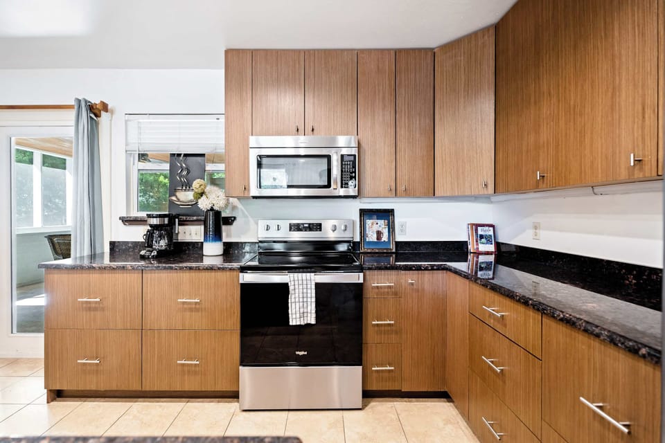 Full kitchen with stainless steel appliances