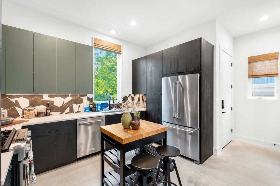 The updated kitchen offers ample space & all the comforts of home