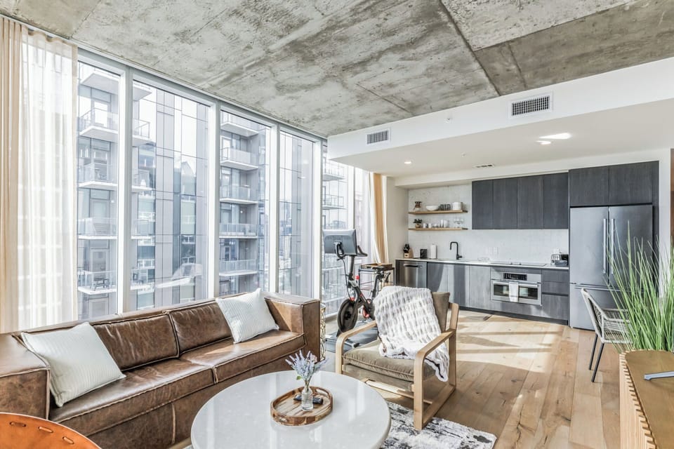 Bright living space with Smart TV, and sofa sleeper
