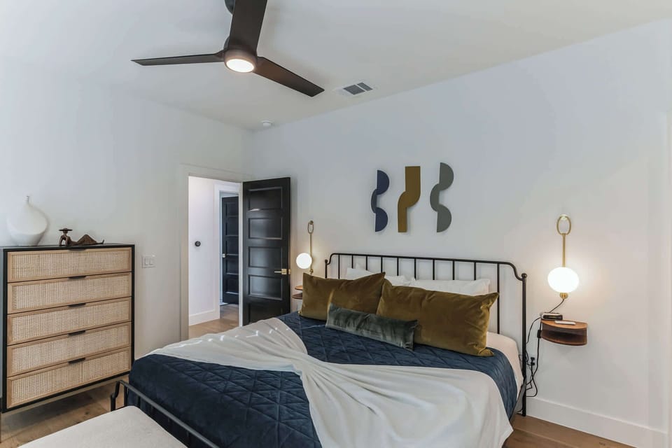 Bedroom 1 with King bed, en-suite, and balcony