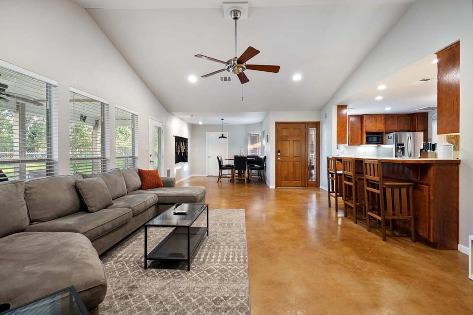 Relax with a movie on the queen sleeper sofa in the main house living room