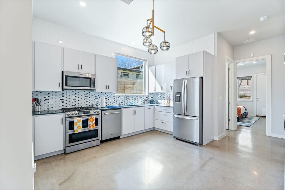 The kitchen is a chef’s dream, offering ample space & every home comfort