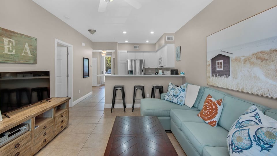 Condo, Multiple Beds, Patio, Garden View (The Village Unit 412) | Living area | 42-inch flat-screen TV with digital channels
