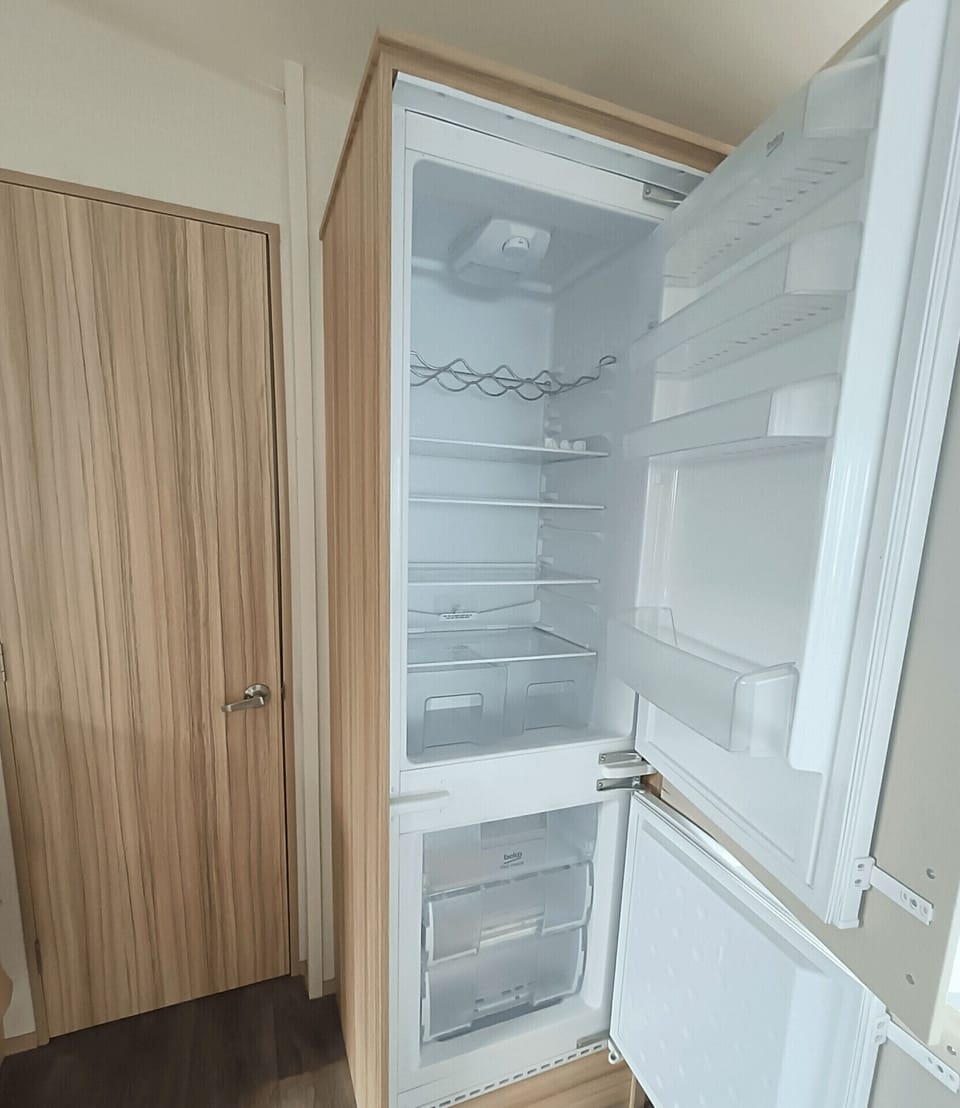 Kitchen with a spacious fridge and freezer