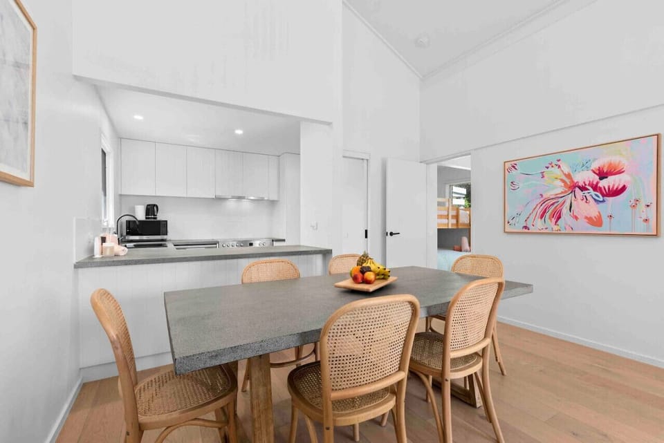 🍽️ Kitchen dining area with table set and bright interior