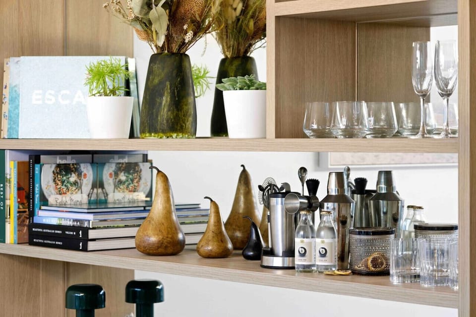 🍸 Bar Area Stylish bar area with glassware and storage.