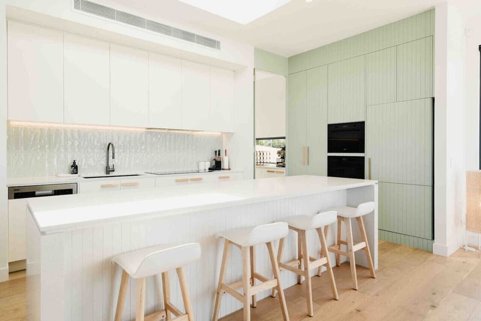 Modern kitchen with island seating and premium finishes
