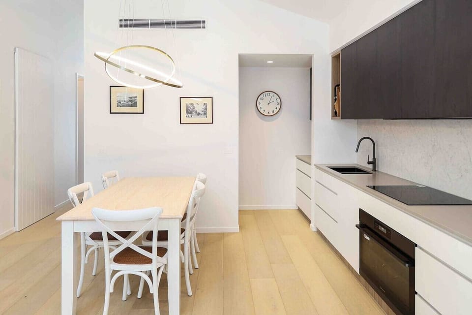 Bright open-plan dining and kitchen with modern finishes