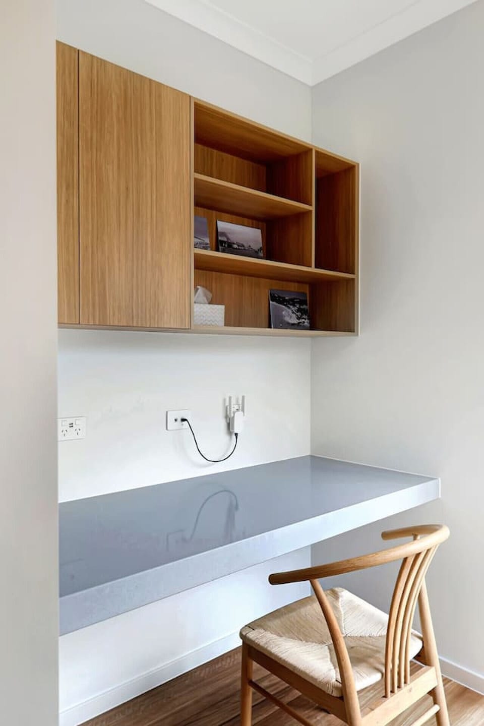 Dedicated workspace with desk and built-in shelving