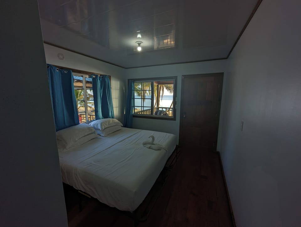 Pink Cabana King bed (2 bedrooms facing sea)