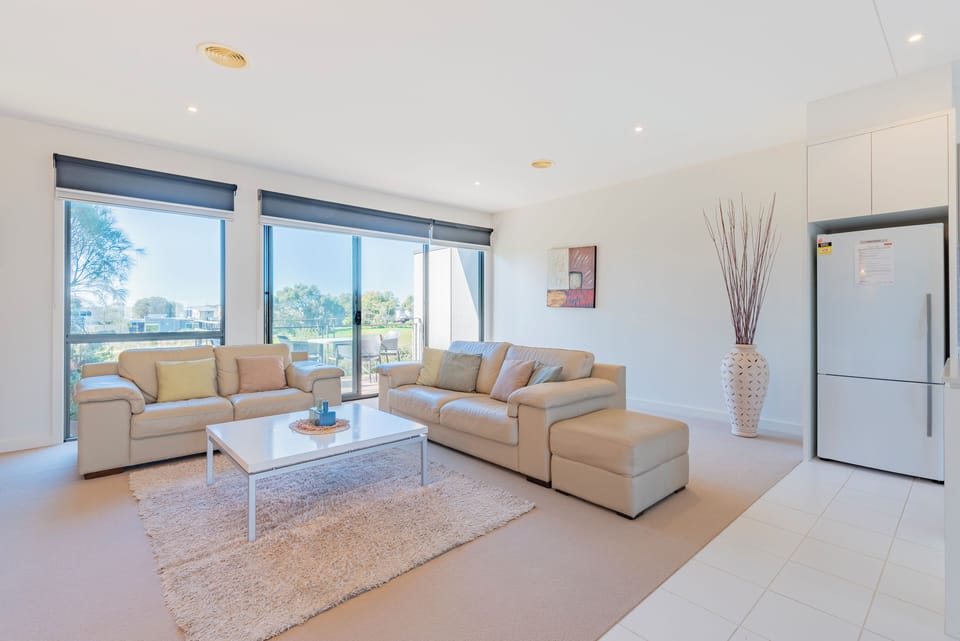 Standard Condo, Balcony, Garden View | Living area | 50-inch flat-screen TV with digital channels