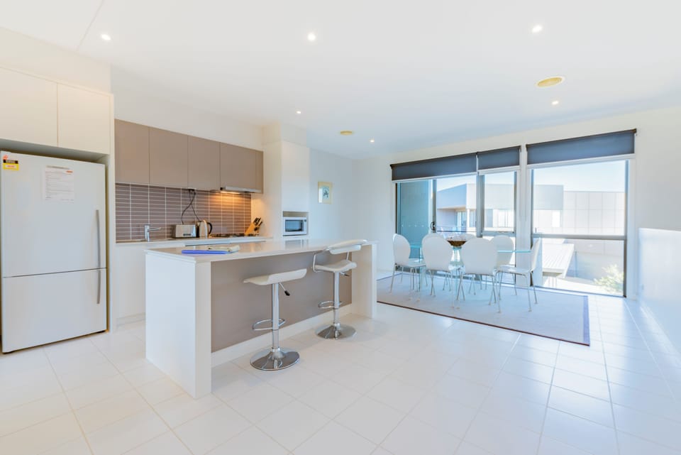 Standard Condo, Balcony, Garden View | Living area | 50-inch flat-screen TV with digital channels