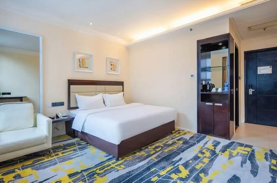 Comfort Room, City View | Bathroom | Hair dryer, slippers, towels, soap