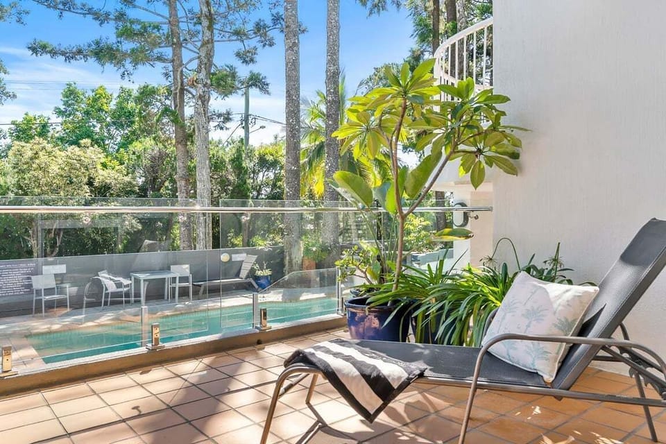 View from balcony overlooking shared pool