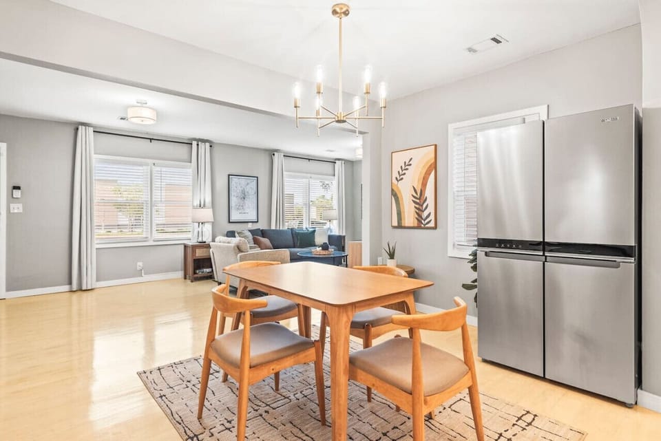 Our home features a dedicated dining area on both the main level and the basement level, providing plenty of space for meals together with family or friends.
