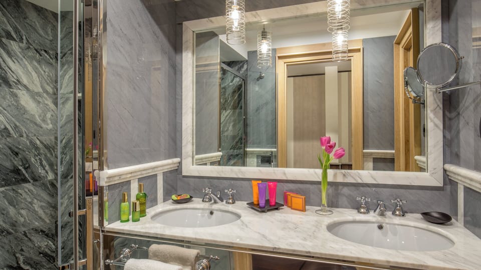 Rainfall showerhead, hair dryer, slippers, towels