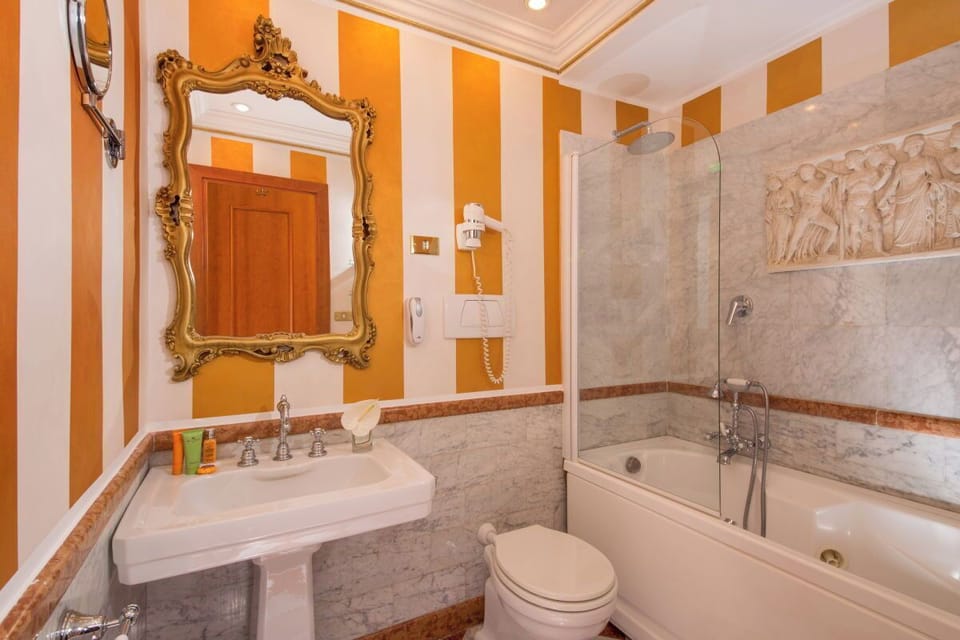Luxury Family | Bathroom | Hair dryer, towels, soap, shampoo