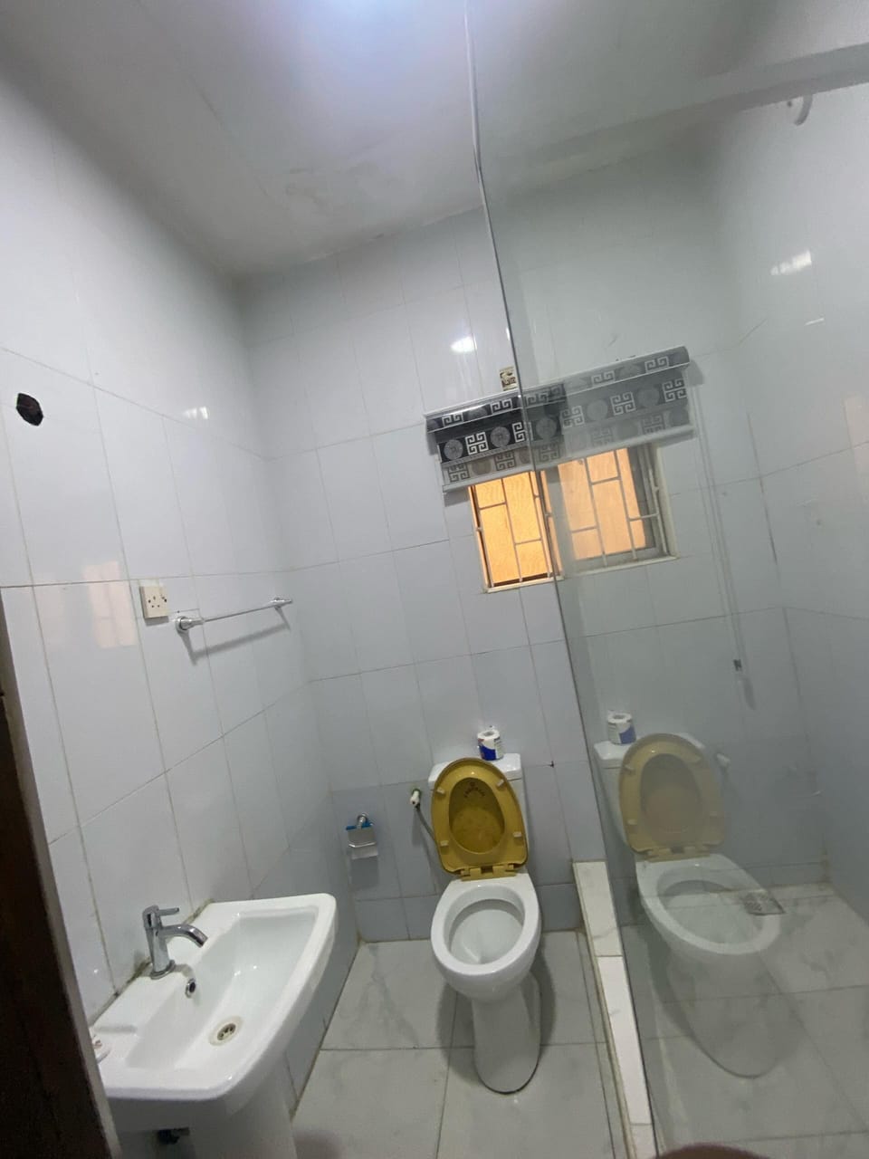 Shower, towels, soap, toilet paper