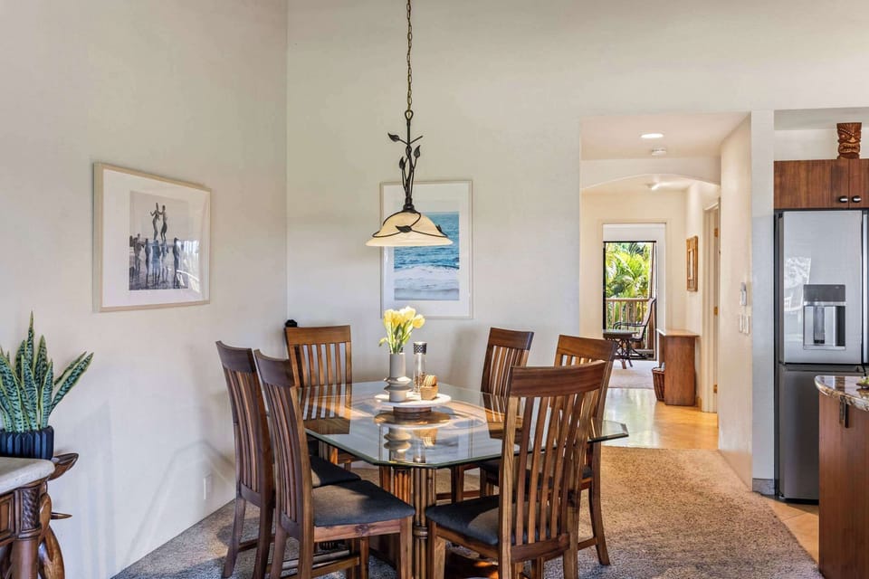 Dine in comfort with seating for 6, plus easy access to your private lanai for tropical breezes!