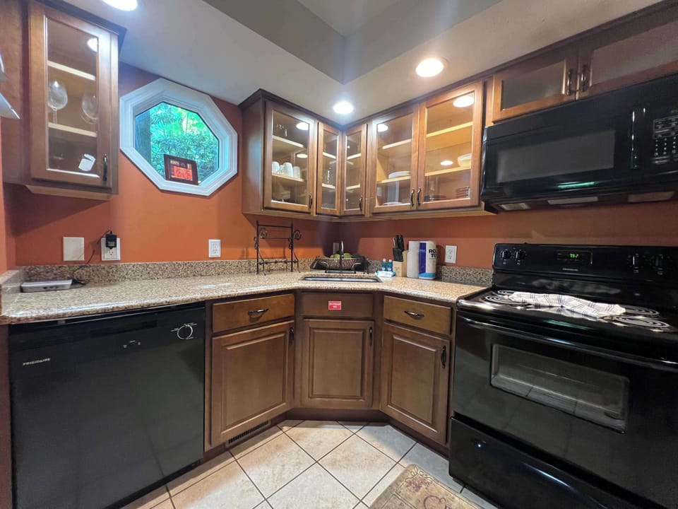 The warm, inviting kitchen offers ample space & every home comfort