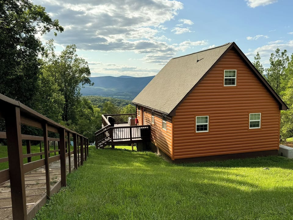 House from the road. You can get a peek at the amazing mountain view. 
