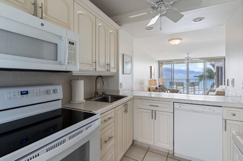 Condo, 2 Bedrooms | Private kitchen | Coffee/tea maker, fridge, oven, toaster
