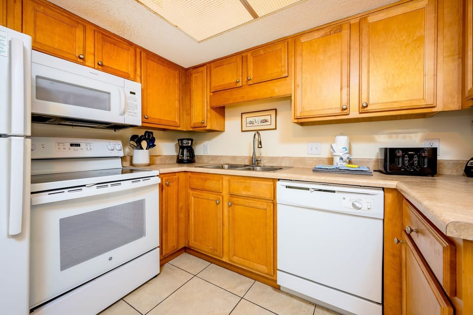 Condo, 2 Bedrooms | Private kitchen | Coffee/tea maker, fridge, oven