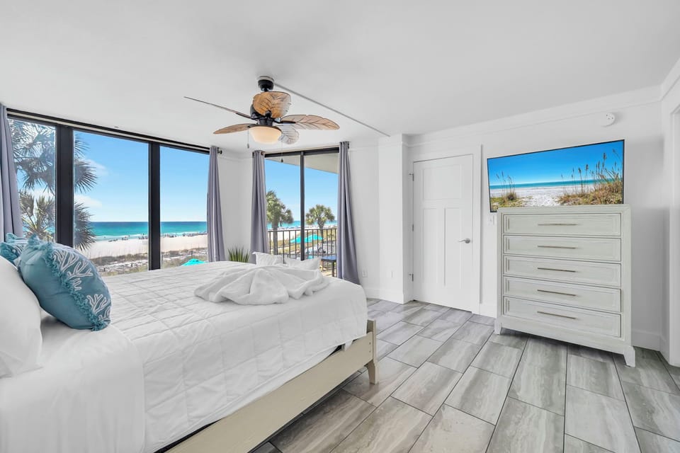 King bedroom with balcony access