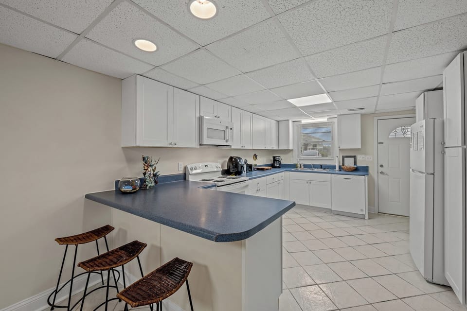 The kitchen counter provides additional space for serving snacks or meals.