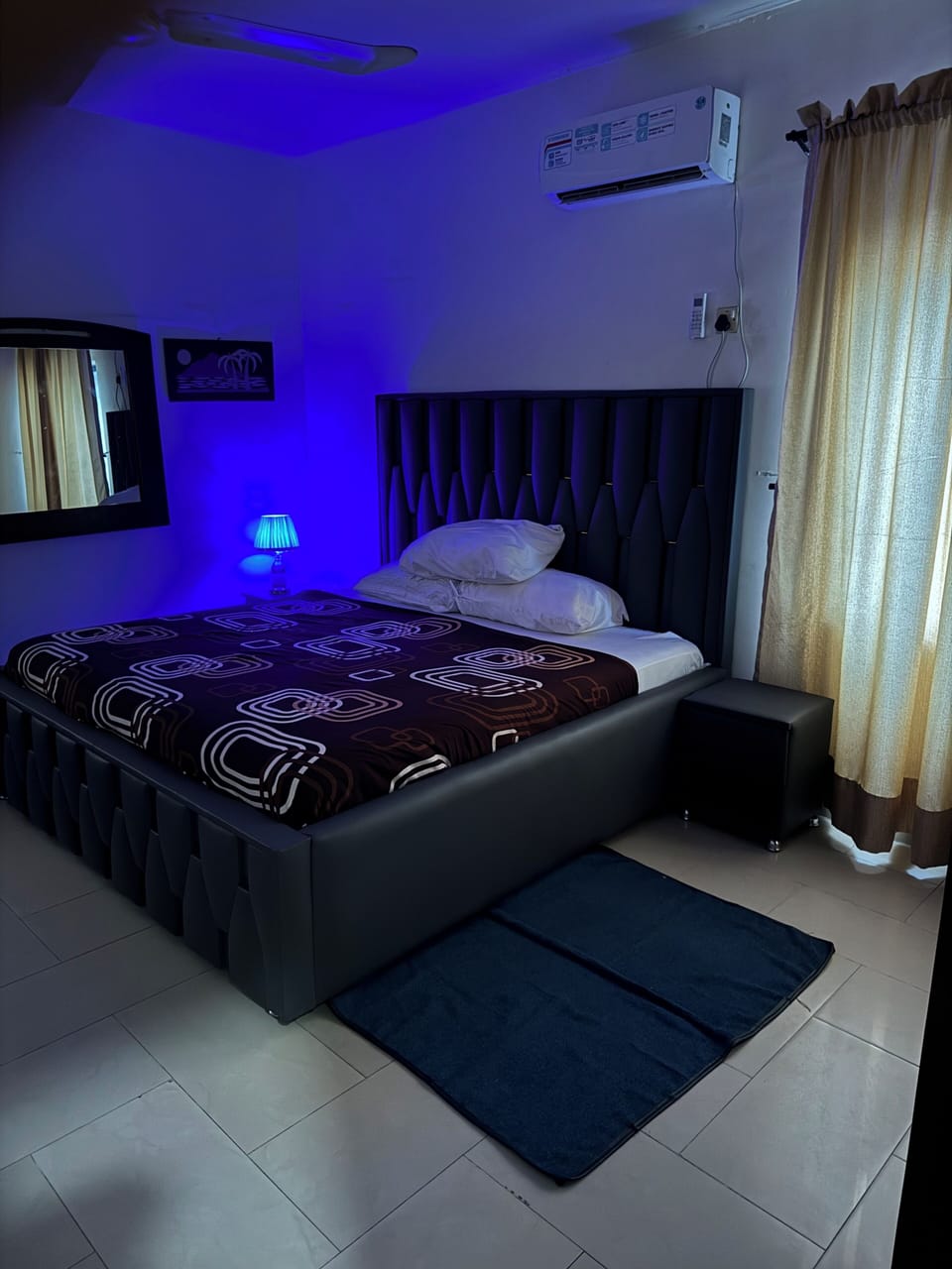 Desk, laptop workspace, bed sheets