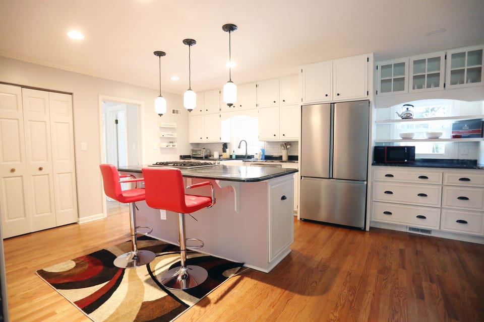 Kitchen perspective from family room behind