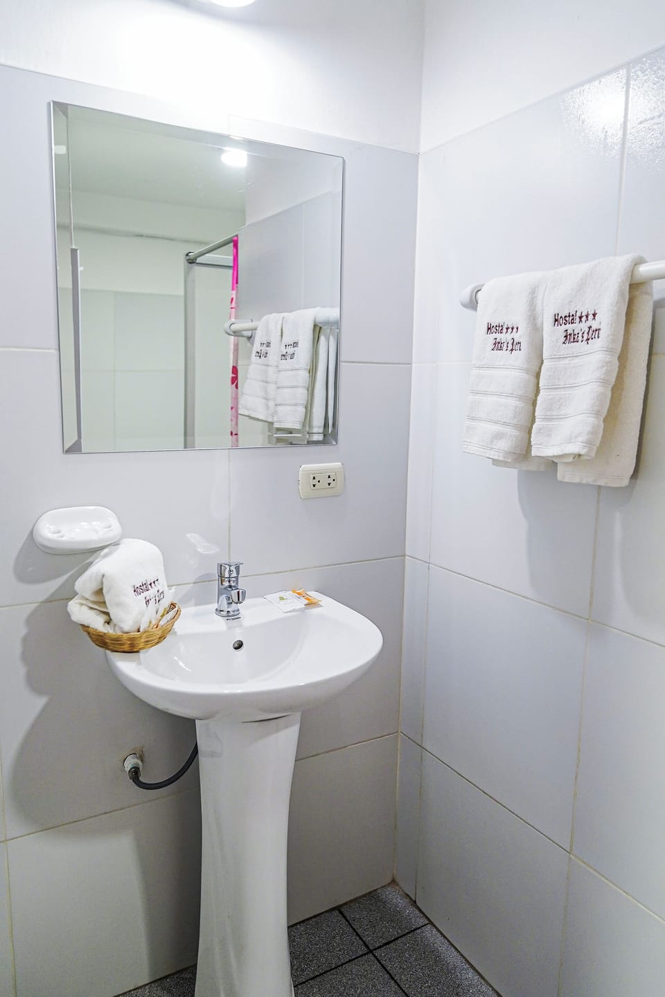 Hair dryer, towels, soap, shampoo