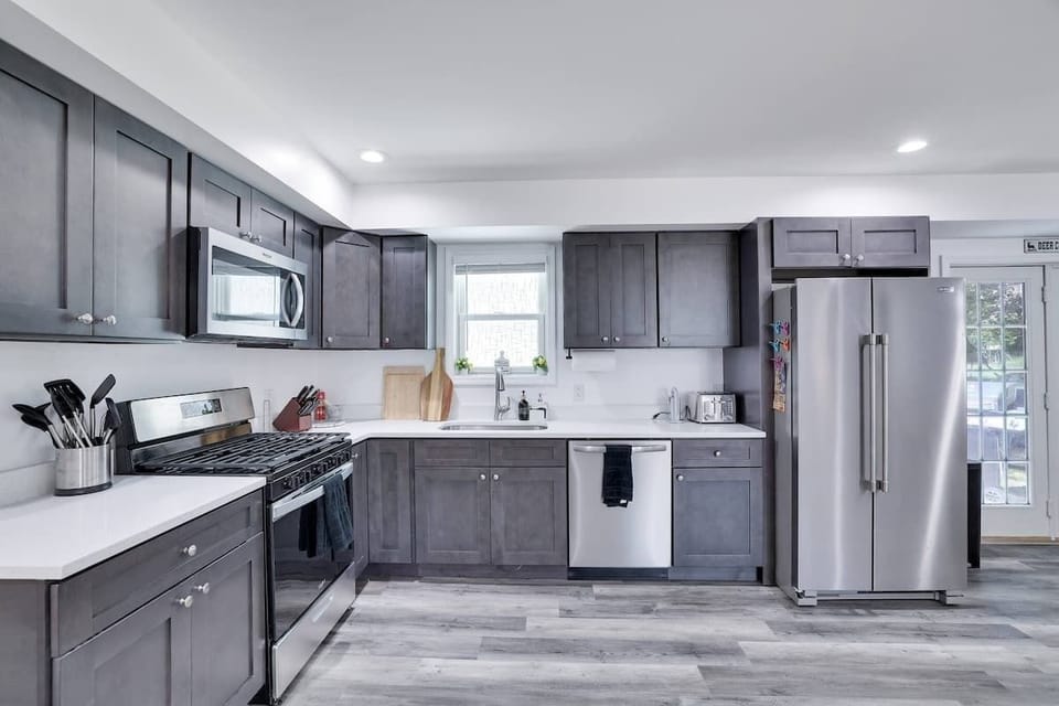 Large, modern kitchen equipped with all the essentials for your cooking needs