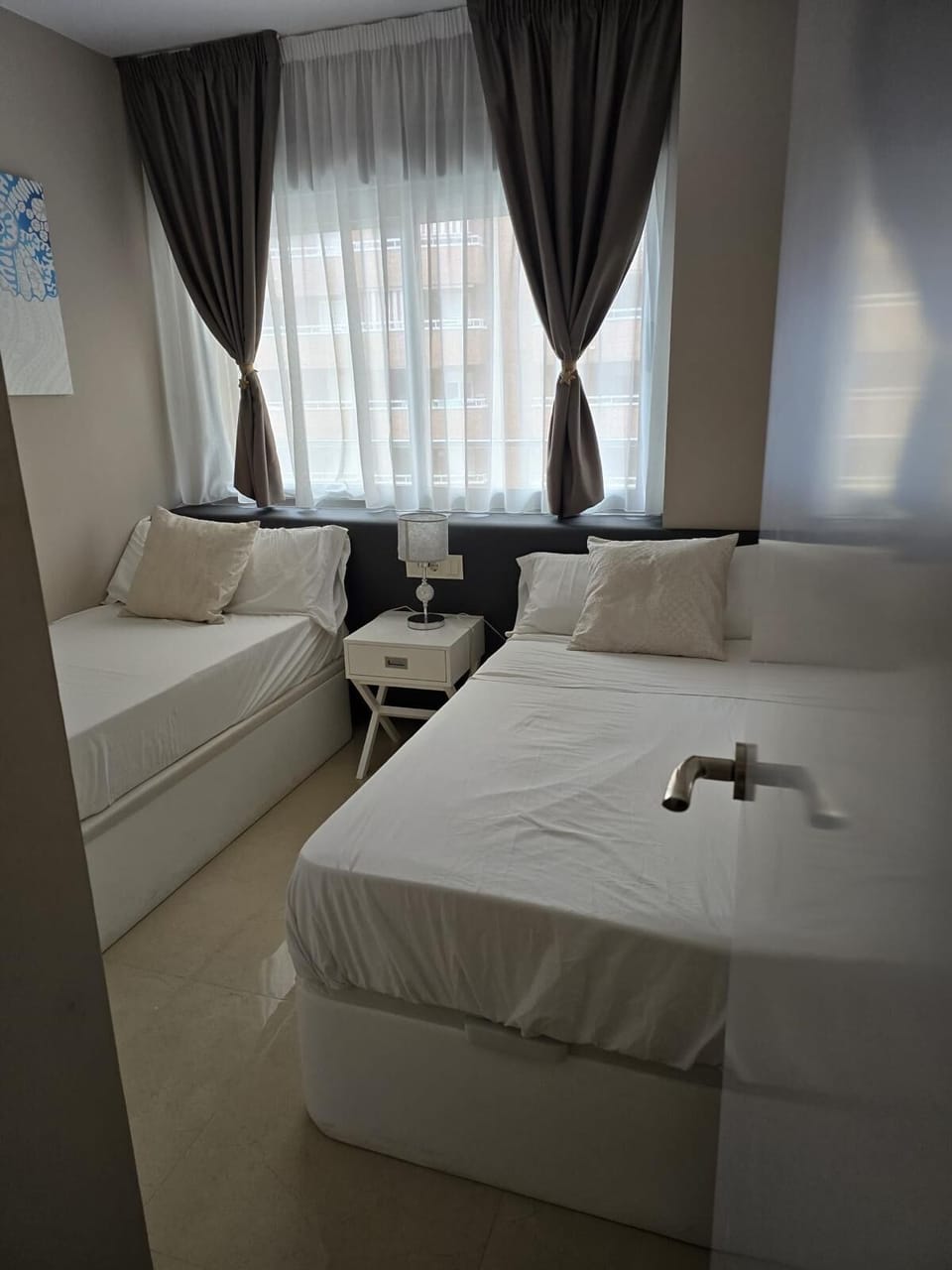 Classic Quadruple Room, City View | Free WiFi