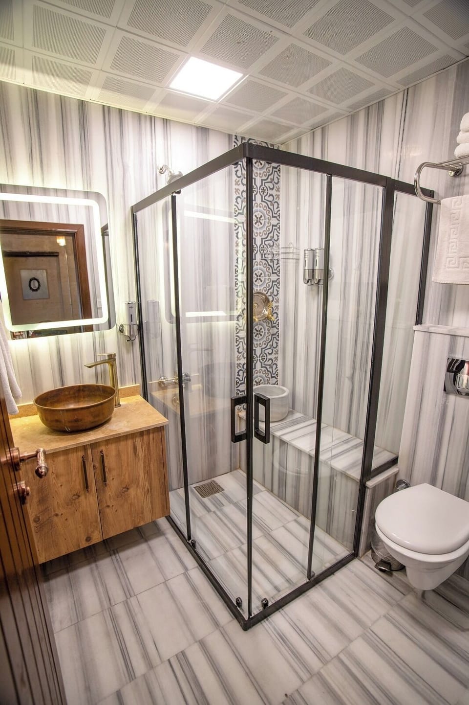 Family Triple Room | Bathroom | Shower, hair dryer, slippers, towels