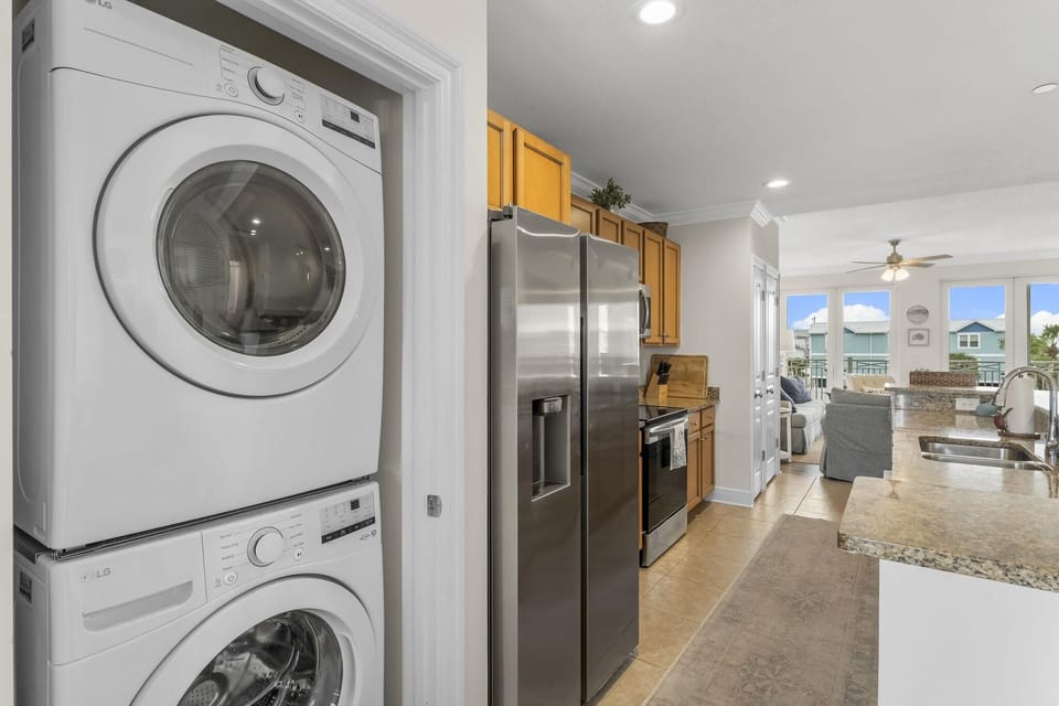 Enjoy the convenience of in-unit laundry with a stacked washer and dryer, keeping your beach clothes fresh throughout your stay.