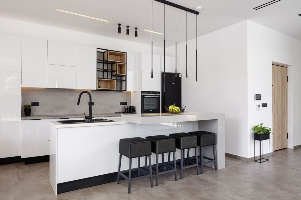 A sleek, Euro-style kitchen equipped with everything you need.