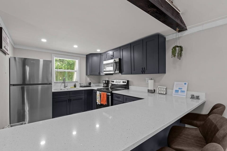New, fully stocked kitchen with all cooking essentials. Blender, Coffee Machine, Toaster, Pots, Pans