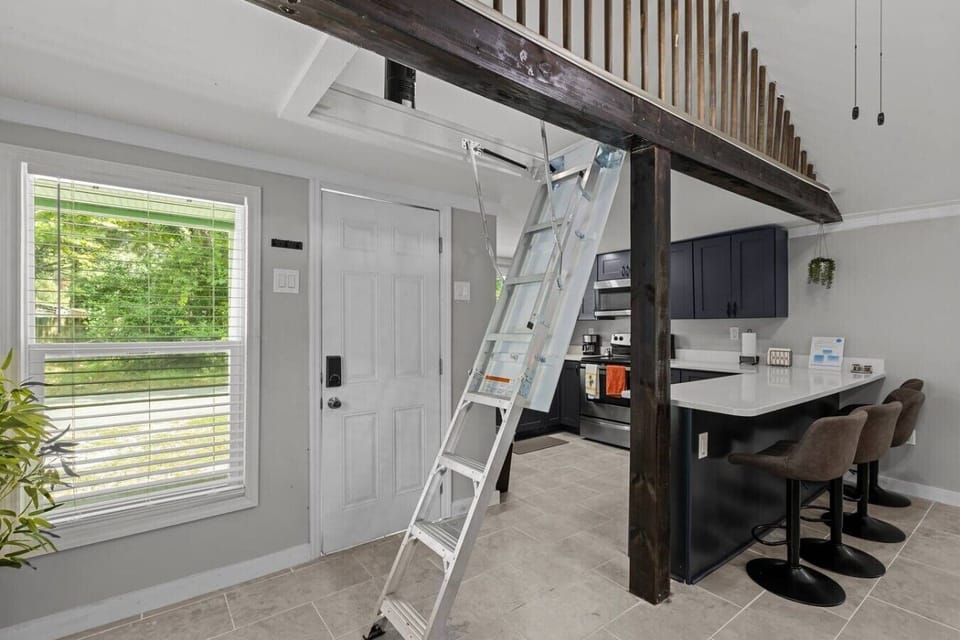 Attic entrance to second floor bedroom. Its just one slight pull away!