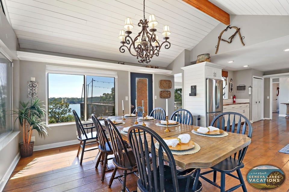 One of 2 dining tables that seats 8. Located off kitchen.
