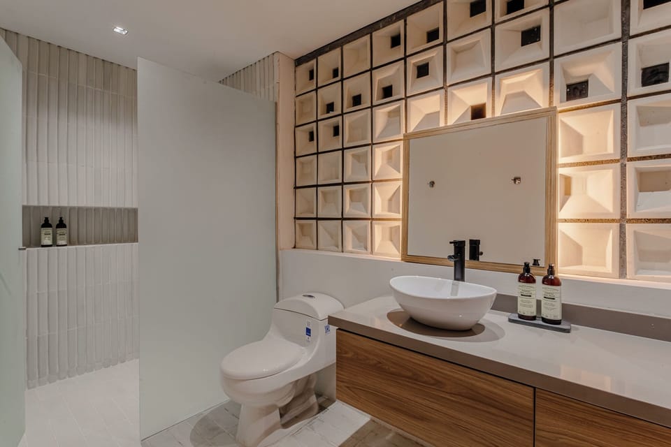 Hair dryer, towels, soap, shampoo