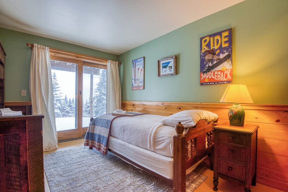 Sliding door to ski in/out access through bedroom