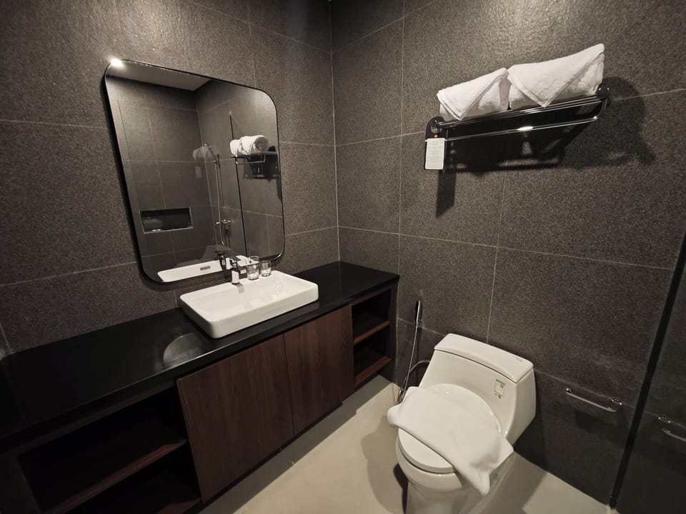 Shower, free toiletries, hair dryer, towels