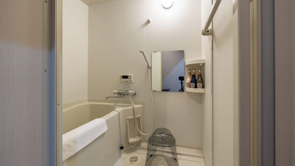 Standard Quadruple Room | Bathroom | Combined shower/tub, hair dryer, bathrobes, towels