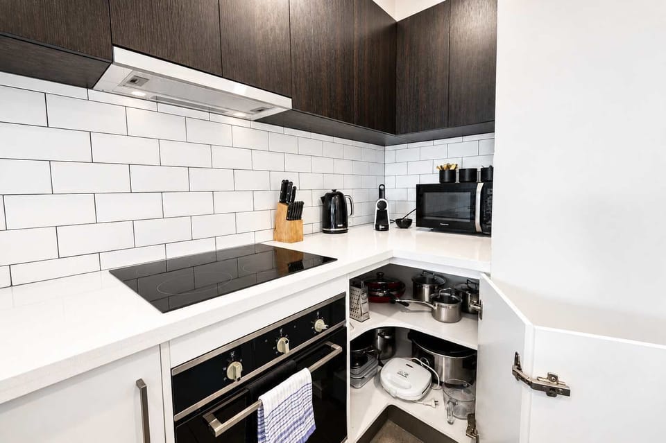 A well-stocked kitchen with plenty of crockery, glassware and dining essentials for larger groups.