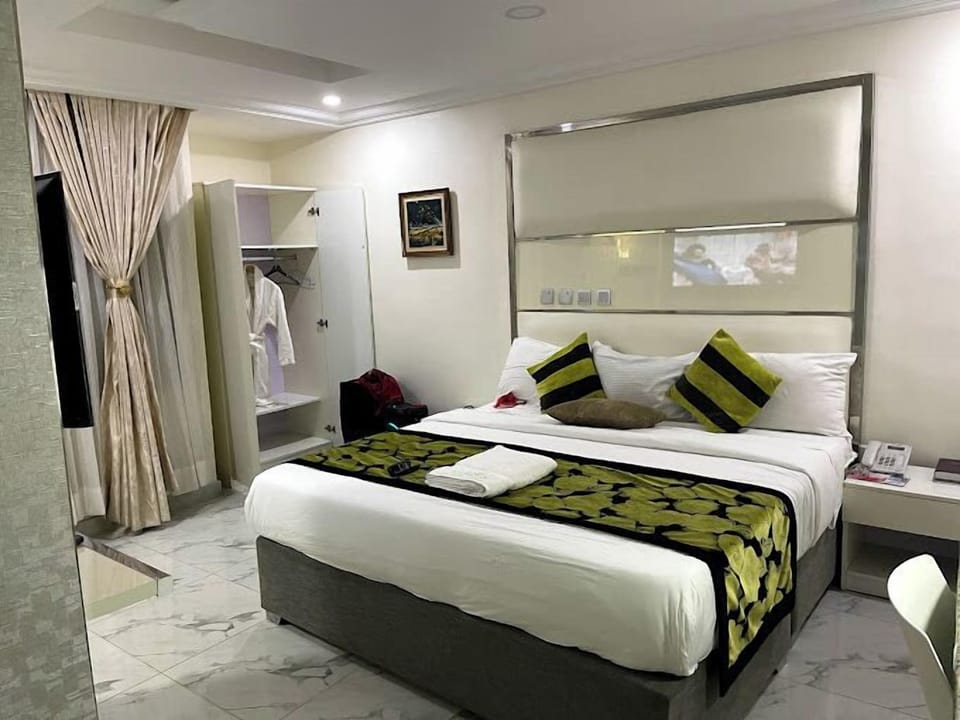 Economy Room, Balcony, City View | Desk, laptop workspace, free WiFi
